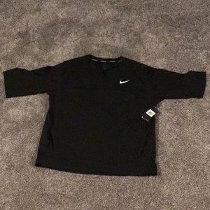 Nike 3/4 sleeve baseball jacket. Vented sleeves. Zippered connected pockets. XXL